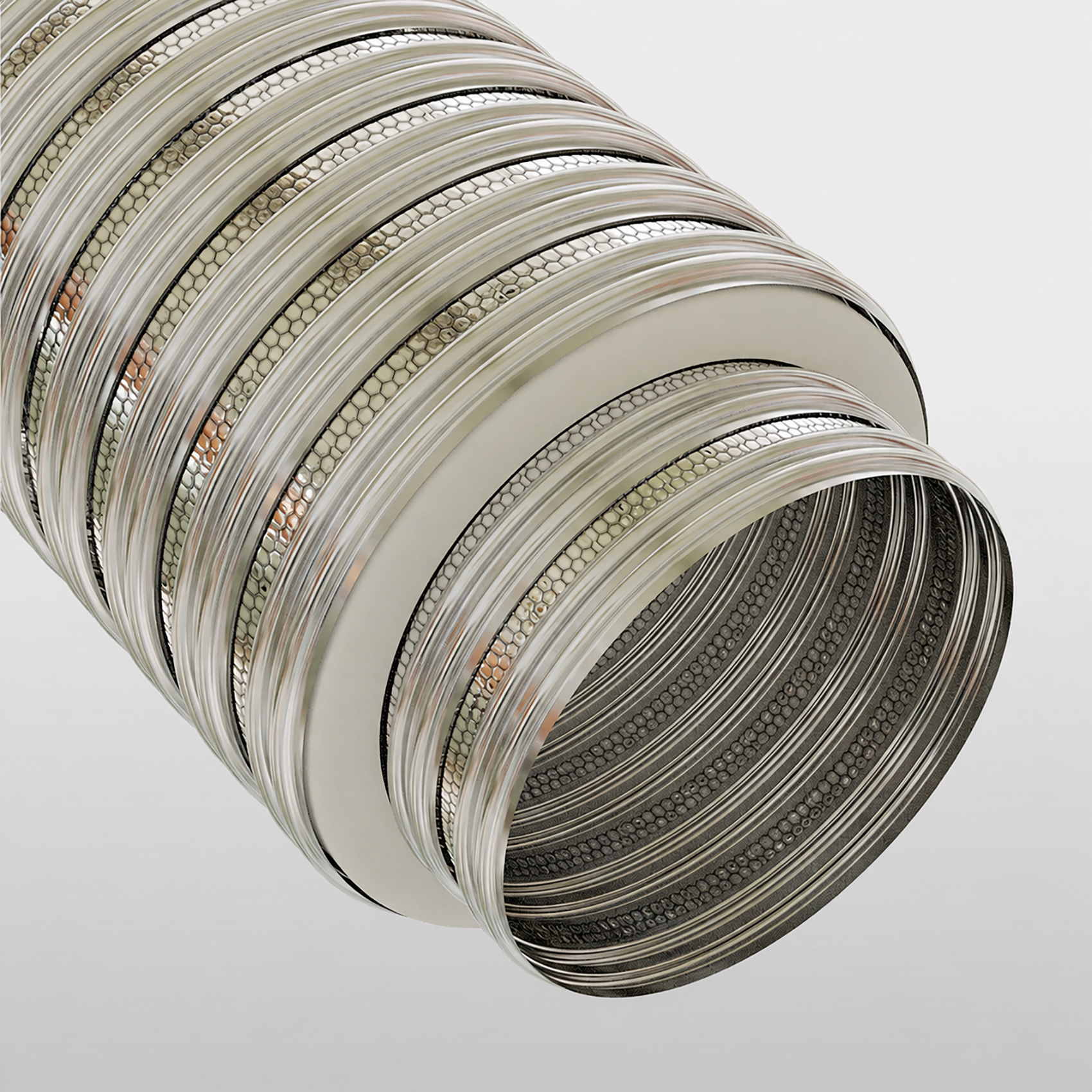 Zoom sur le TENFLEX-iso, tubage flexible double peau en Inox 316, recouvert d’un isolant d’épaisseur 13 mm lui-même entouré d’un flexible en Aluminium épais / flexibles isolés